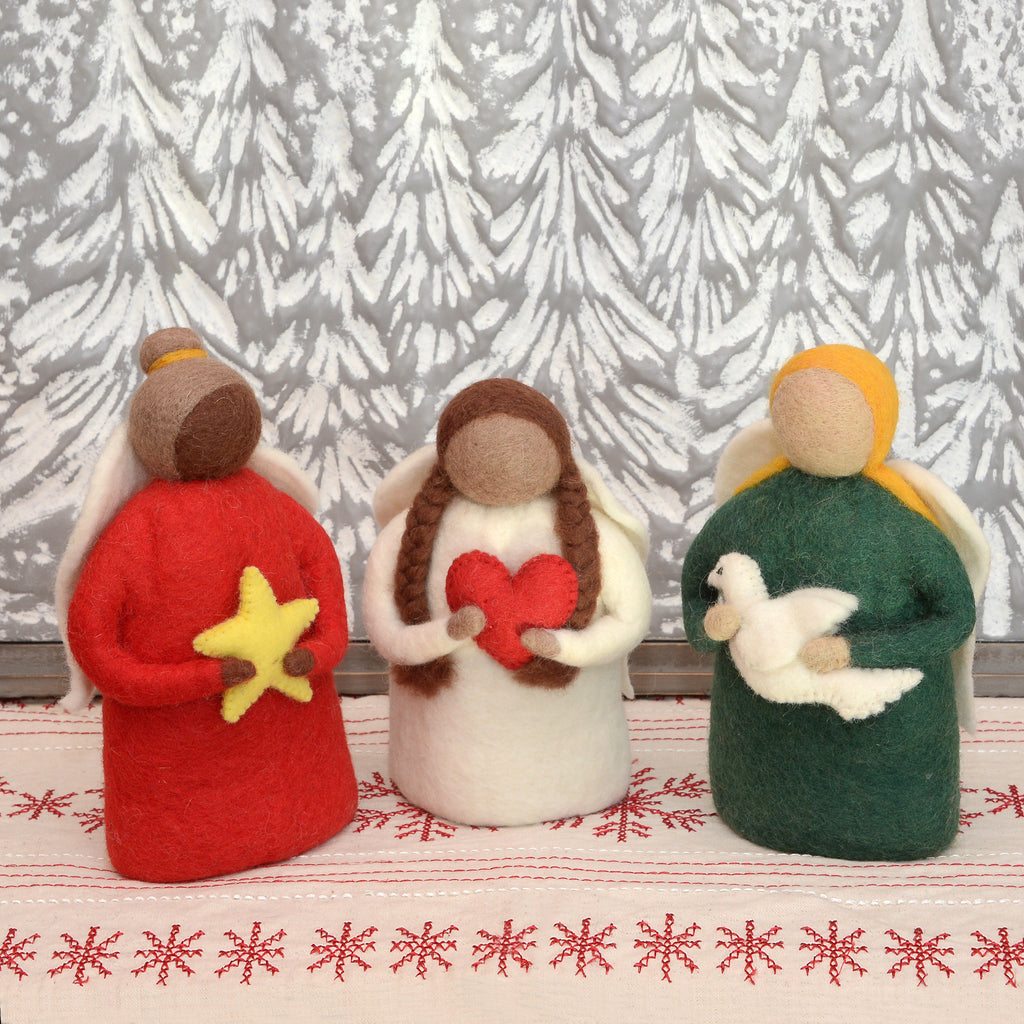 While these beauties are technically felt angel tree topper options, they can also be mantle decor!