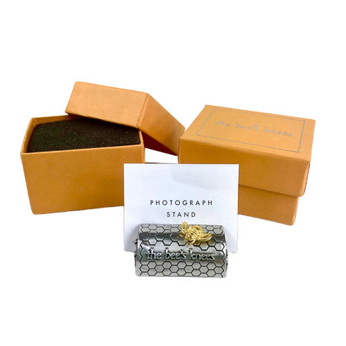 Featuring a golden honeybee and embossed with the phrase, "the bees knees," these photo stands would be a thoughtful graduation or bridal party gift. What an easy way to keep those favorite mementos close at hand!  Cast in 100% lead-free fine pewter Made in Vermont Beautifully gift boxed