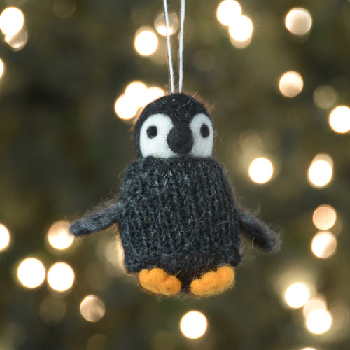No cold penguin ornament on our watch! He's always donning this cute grey sweater.