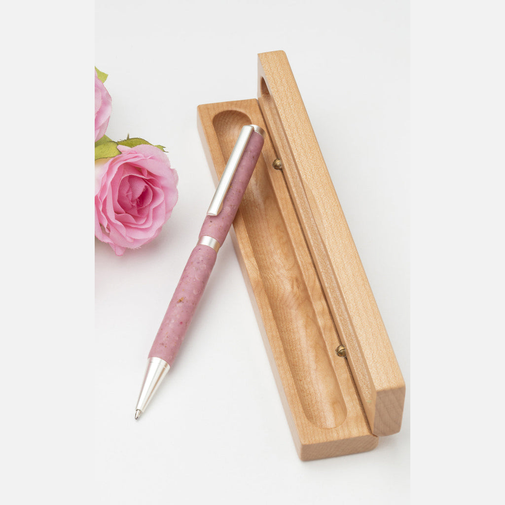 Handmade pink rose pen is crafted with transparent polymer and textured with artist's own locally grown roses. Shown with wooden gift box.