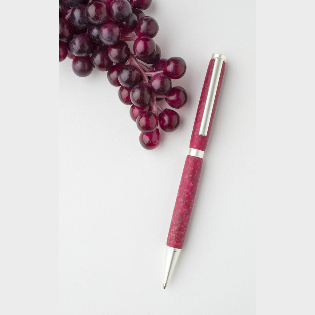 Merlot hued handmade happy hour wine pen is crafted with transparent polymer and textured with locally grown dried crushed grapes.