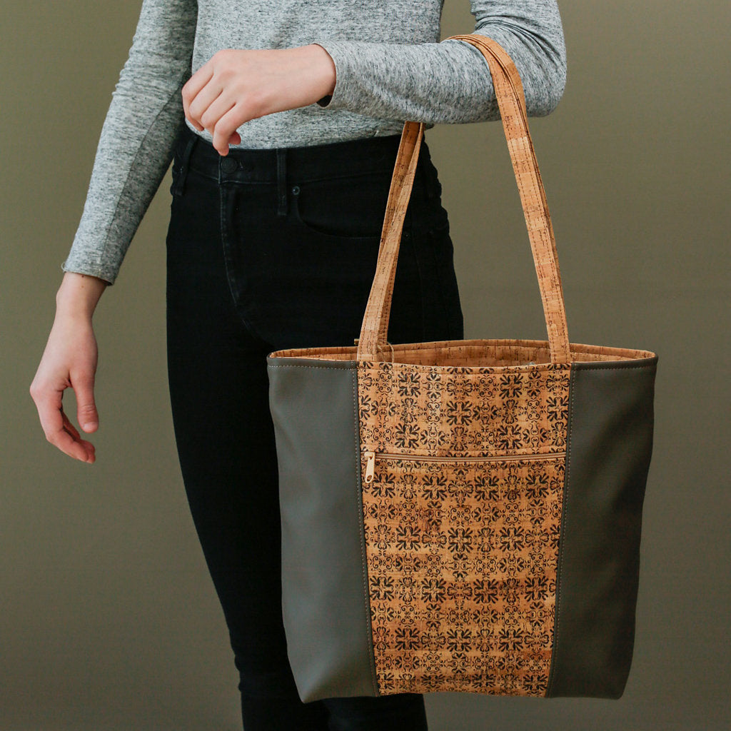 13”H x 17”W x 5”D Vegan friendly cork & PVC-free faux leather purse lined with 100% organic cotton produced in Fair Trade certified facility. Made in USA. Choice of colors: Cork Print with Greige Leather - Solid Cork with Black Leather - Solid Cork with Greige Leather.